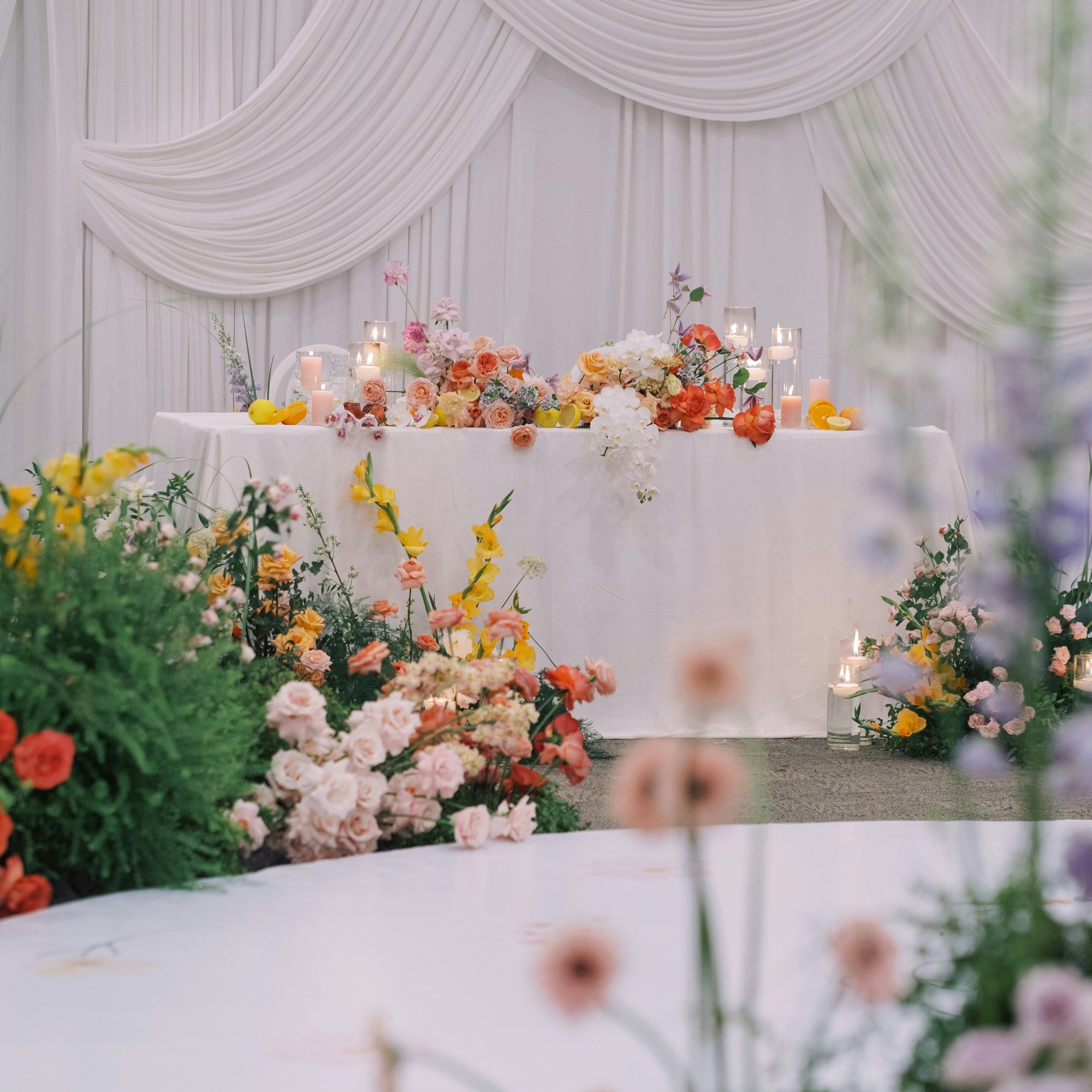 h-ng-xuan-van-long and low table floral design summer fall wedding-unsplash Stock SQUARE