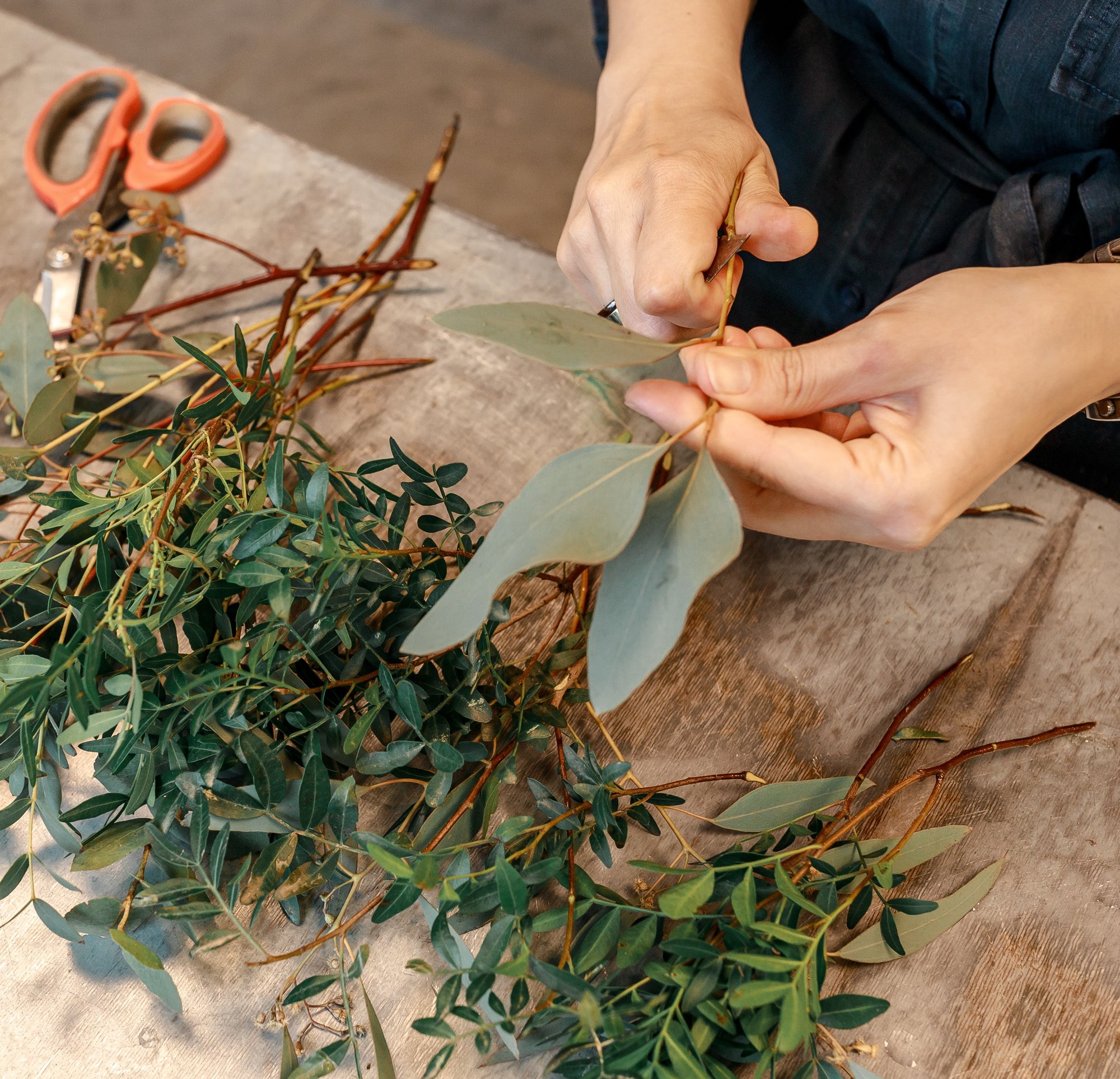hands cutting Floral flower arrangement _STOCK shutterstock_1978809740_SQUARE
